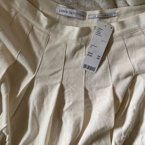 Cream Urban outfitters pleated skirt